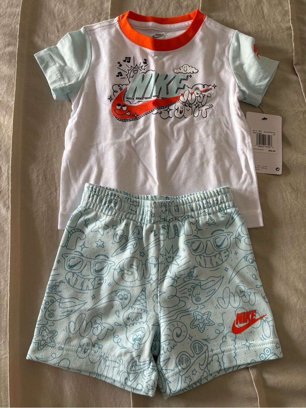 Nike Boys 2-Piece Set in White and Glacier Blue with Orange Accent